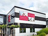 Double panneaux en fa&ccedil;ade pour Olivier Vins (Bouchons) &agrave; Namur - Enseigne