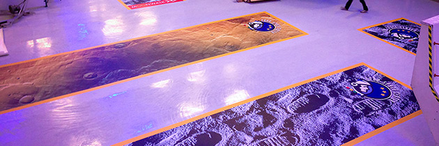 Impression grand format sur autocollant pour sol à L'Euro Space center